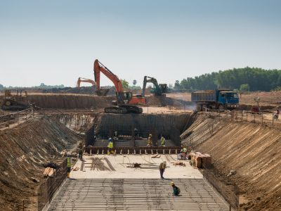 heavy-machines-construction-workers-working-building